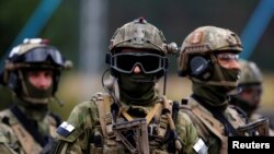 Польскія вайскоўцы ў час вучэньняў NATO ў 2014 годзе.