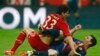 Germany - Bayern Munich's Mario Gomez (L) falls on top of Barcelona's Lionel Messi during their Champions League semi-final first leg soccer match at Arena stadium in Munich, 23Apr2013