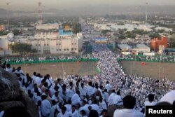 Паломники у города Мекка. 14 октября 2013 года.