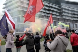 Ілюстрацыйнае фота. Акцыя пратэсту анархістаў на ўваходзе ў гатэль, дзе праходзіў форум «Менскі дыялёг». 7 кастрычніка 2019 году