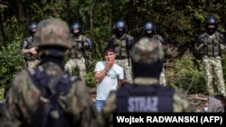 Архіўнае ілюстрацыйнае фота. Мігранты на беларуск-польскай мяжы, жнівень 2021 году