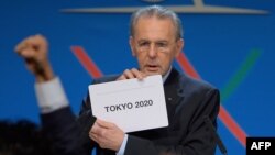 Beynəlxalq Olimpiya Komitəsinin prezidenti Jacques Rogge 2020-ci ildə keçiriləcək Yay Olimpiya Oyunlarının paytaxtının adını açıqlayan zaman